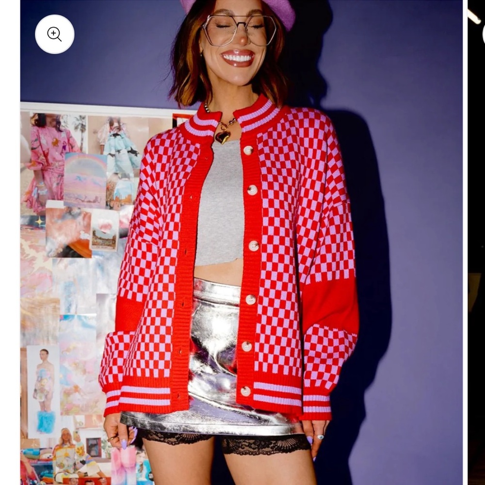 Dressed in lala cardigan. Never worn. Small/medium